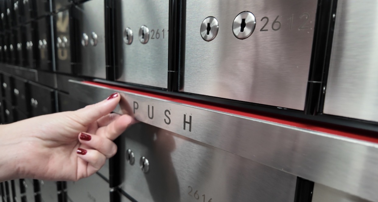 Rows of secure safety deposit boxes